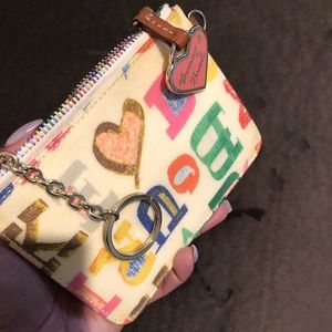 Dooney & Bourke “Doodle” pattern wristlet